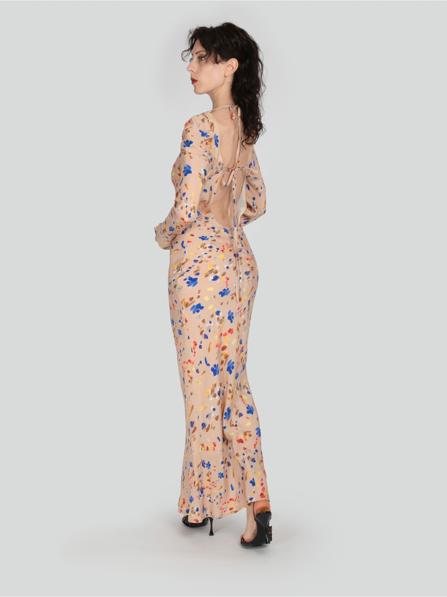 Woman dress, long in floral pattern, long sleeves and cuffs, square neckline with open back and laces. Beige, blue and red color. 100% natural cupro, made in Italy. For sale online!