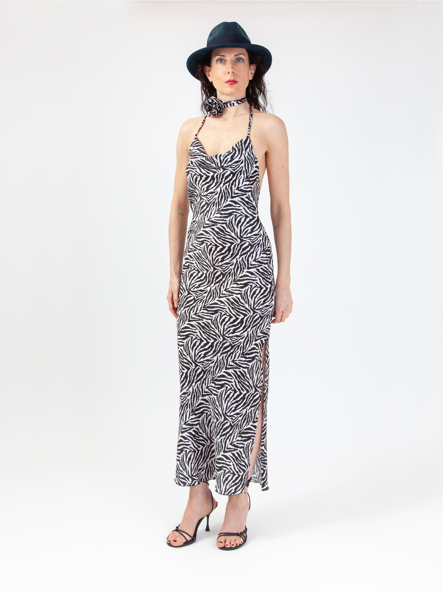 Women's satin dress in animalier pattern, zebra print midi dress, sleeveless, with laces, back out and slit. Black and white colour. 100% viscose, zebra design. made in Italy. Buy online!