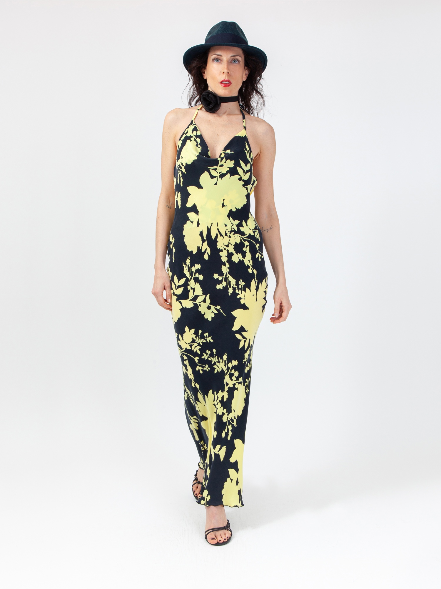Women's floral patterned dress, long dress with yellow and black flower print, sleeveless, laces and back out. Yellow and black colour. 100% natural cupro, made in Italy. For sale online!