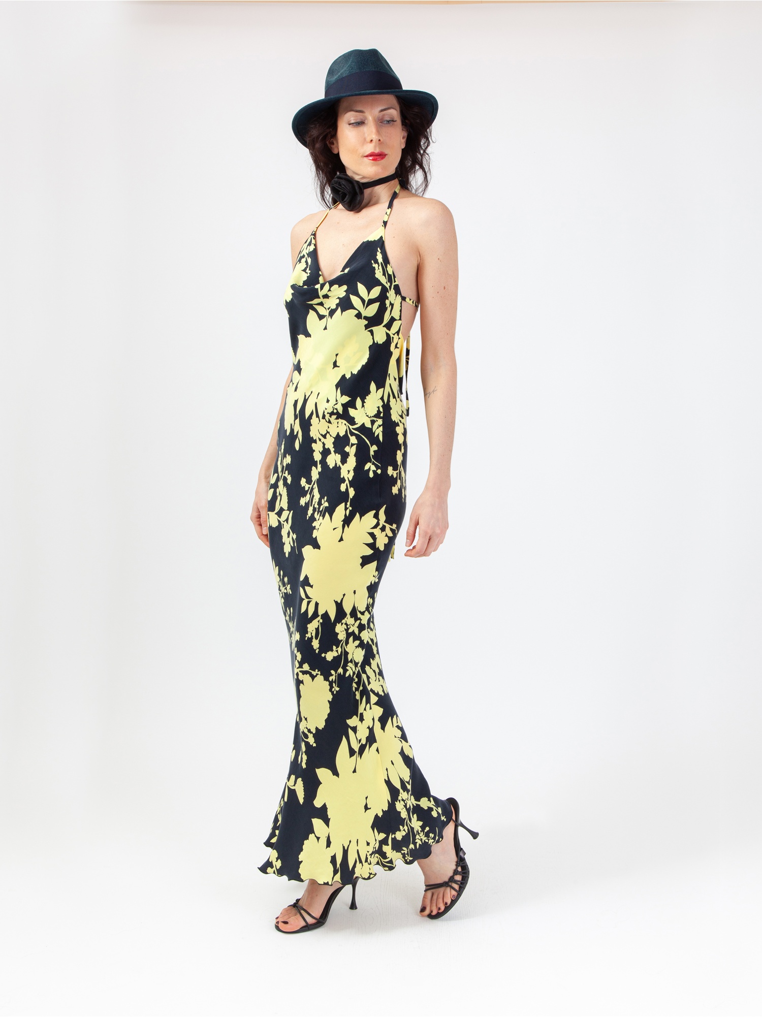 Women's floral patterned dress, long dress with yellow and black flower print, sleeveless, laces and back out. Yellow and black colour. 100% natural cupro, made in Italy. For sale online!