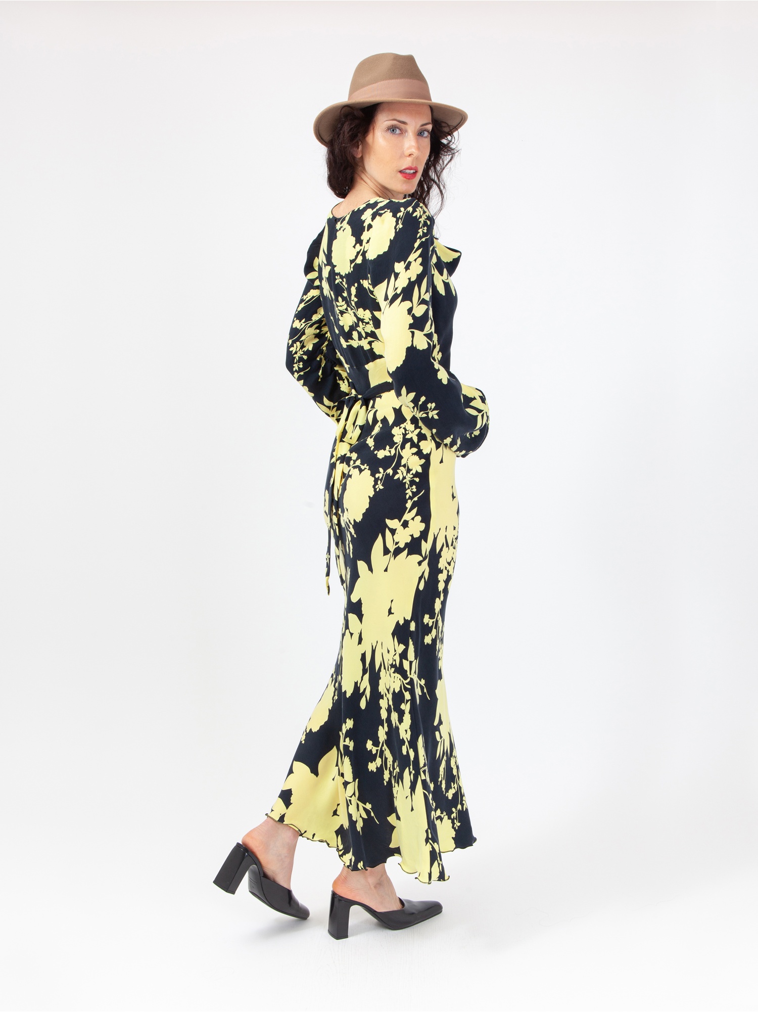 Women's soft dress in floral pattern, black and yellow floral print midi dress, with long gathered sleeves and cowl neckline, ties at the waist. Yellow and black colour. 100% natural cupro, made in Italy. Buy online!