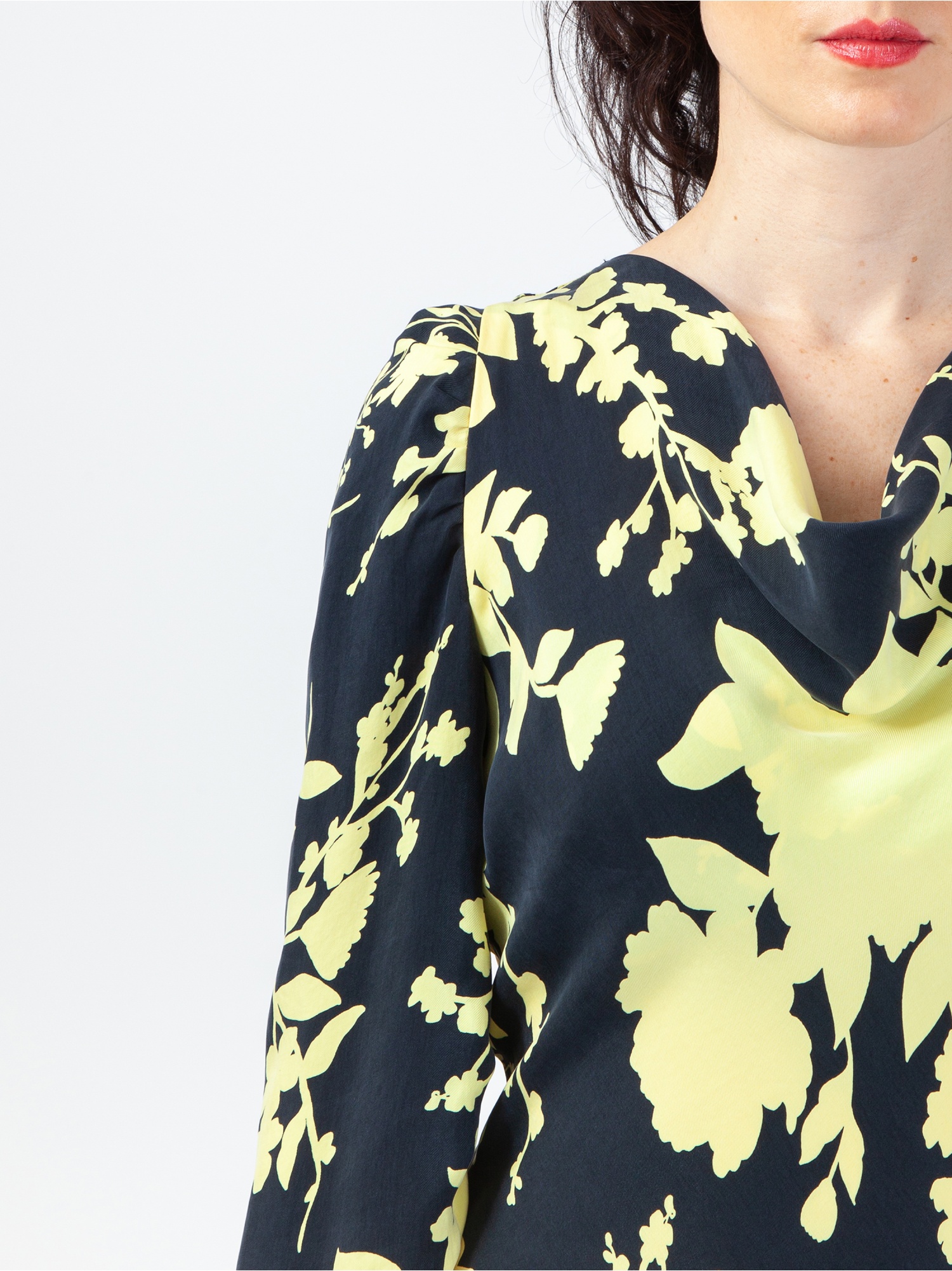 Women's soft dress in floral pattern, black and yellow floral print midi dress, with long gathered sleeves and cowl neckline, ties at the waist. Yellow and black colour. 100% natural cupro, made in Italy. Buy online!