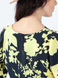 Women's soft dress in floral pattern, black and yellow floral print midi dress, with long gathered sleeves and cowl neckline, ties at the waist. Yellow and black colour. 100% natural cupro, made in Italy. For sale online!