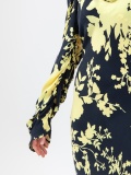 Women's soft dress in floral pattern, black and yellow floral print midi dress, with long gathered sleeves and cowl neckline, ties at the waist. Yellow and black colour. 100% natural cupro, made in Italy. For sale online!