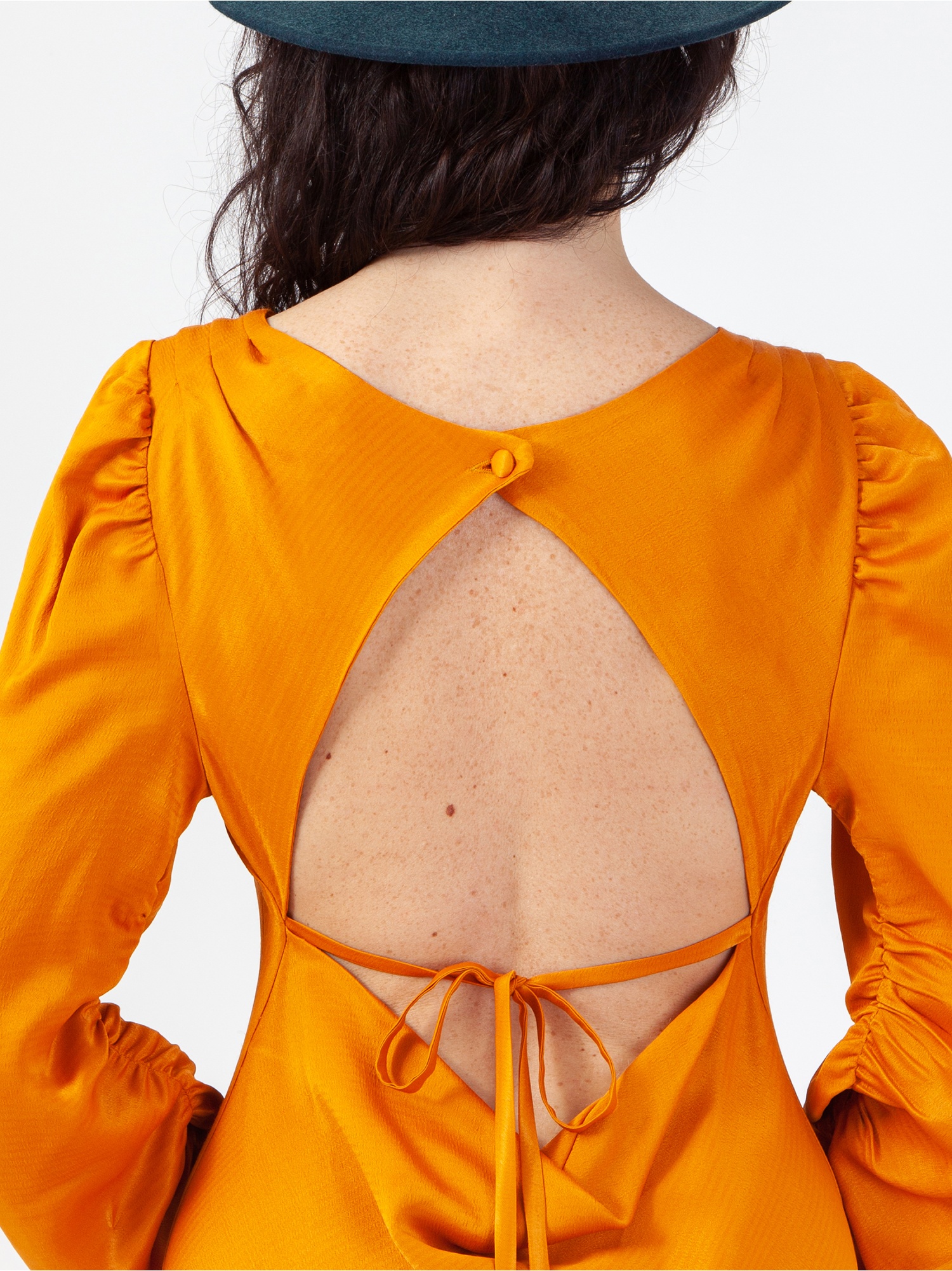 Soft orange satin woman dress, orange long dress, with gathered long sleeves and square neckline, laces at the waist and back out. Orange colour. 100% viscose, made in Italy. For sale online!